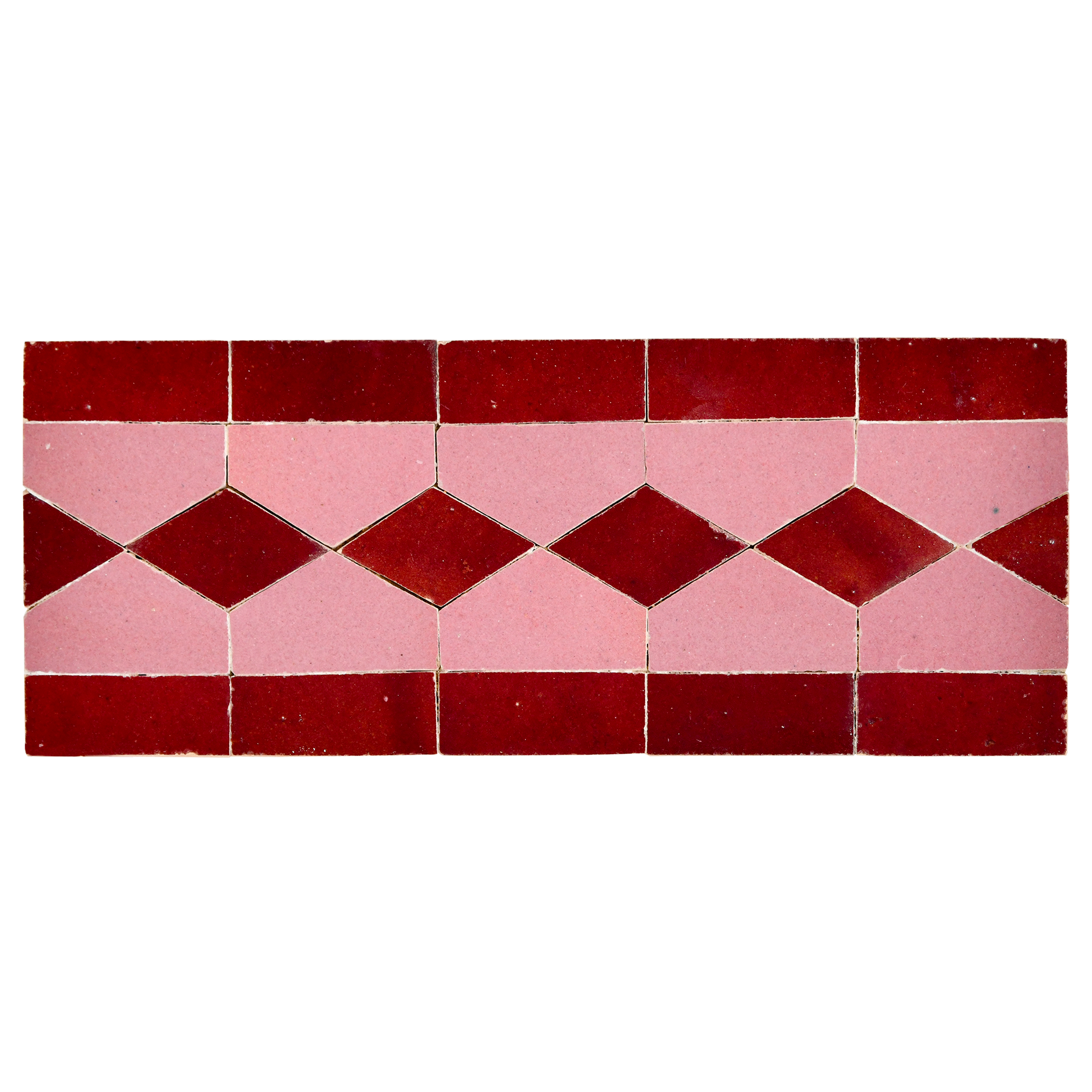 Rectangular tile with a geometric pattern of red and pink diamonds on a white background