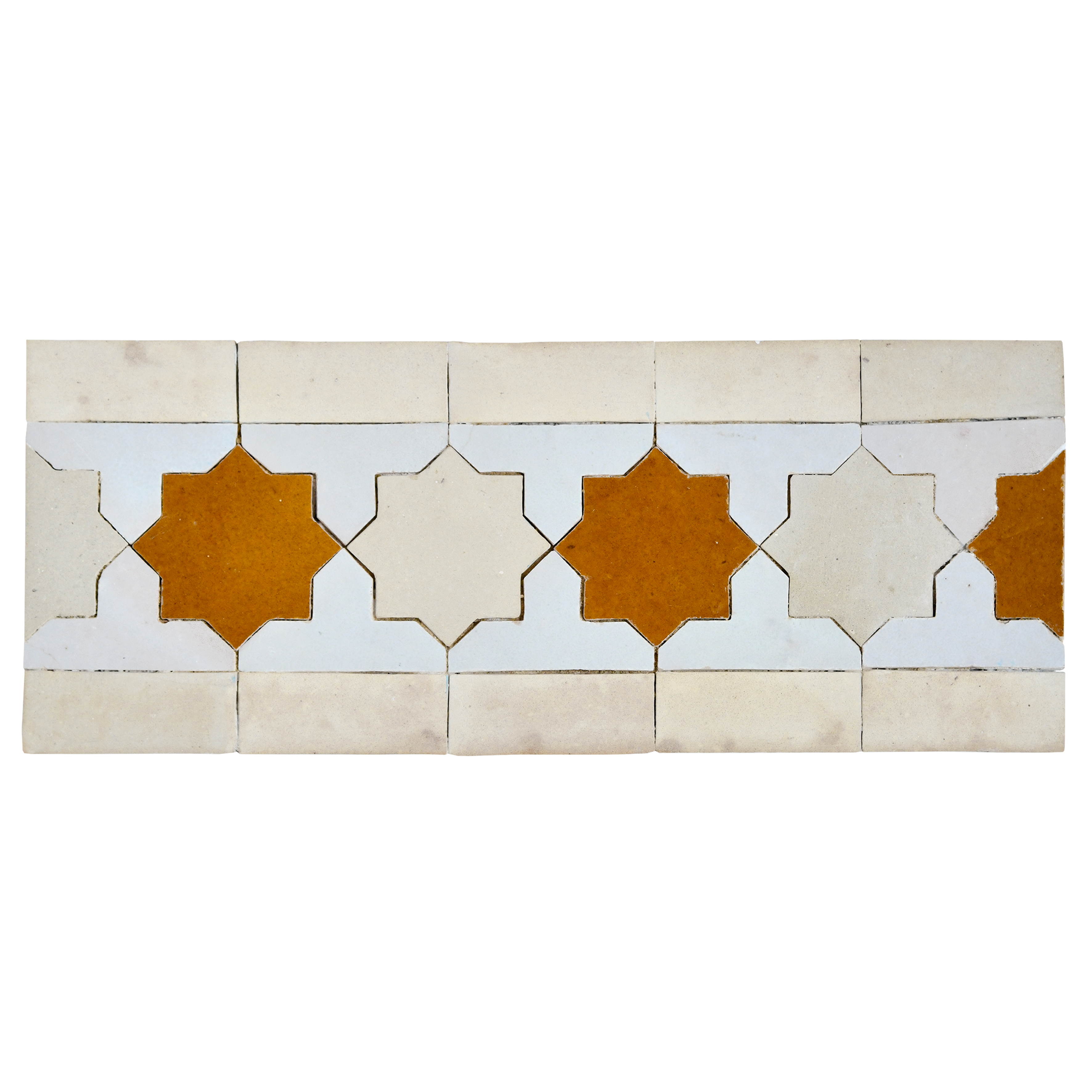 Decorative tiles with star patterns on a white background