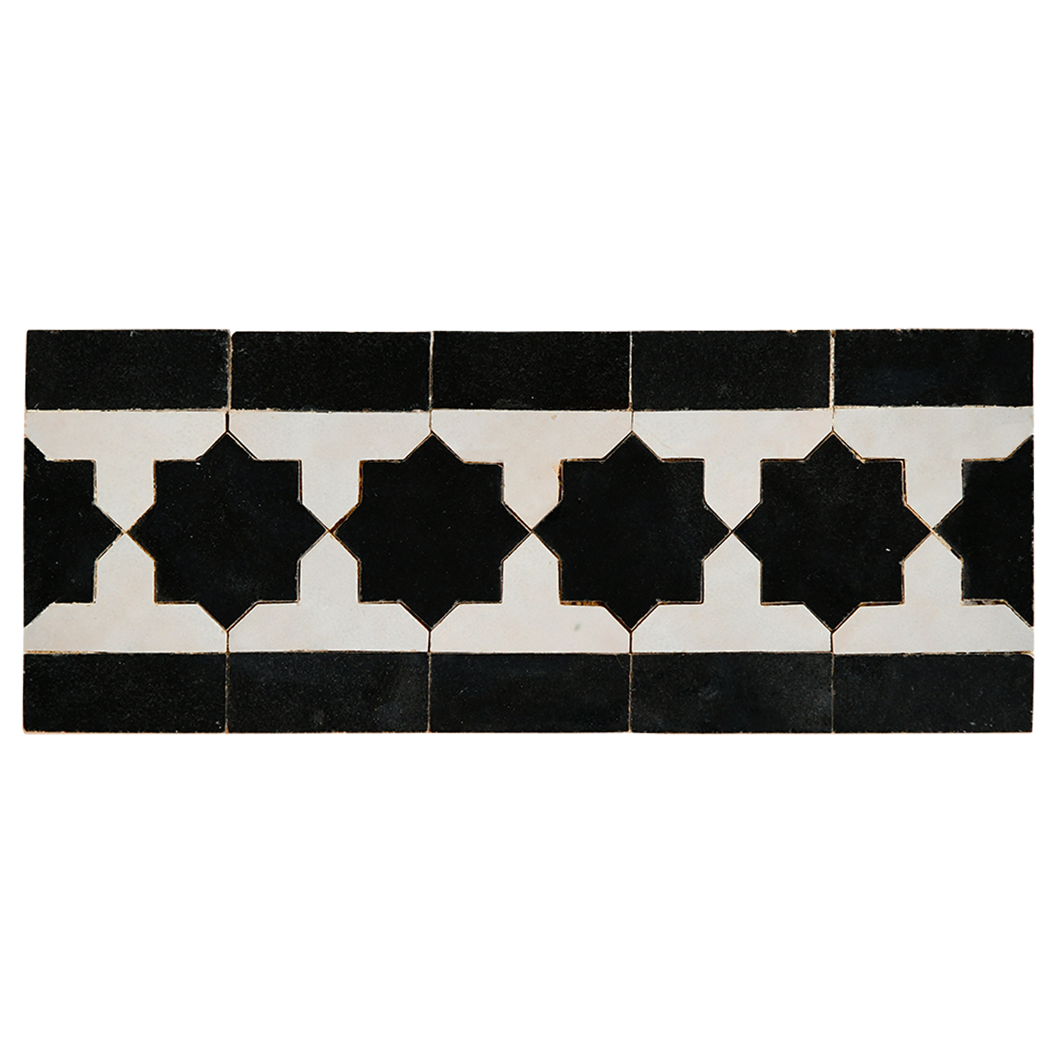 Black and white patterned tiles on a white background
