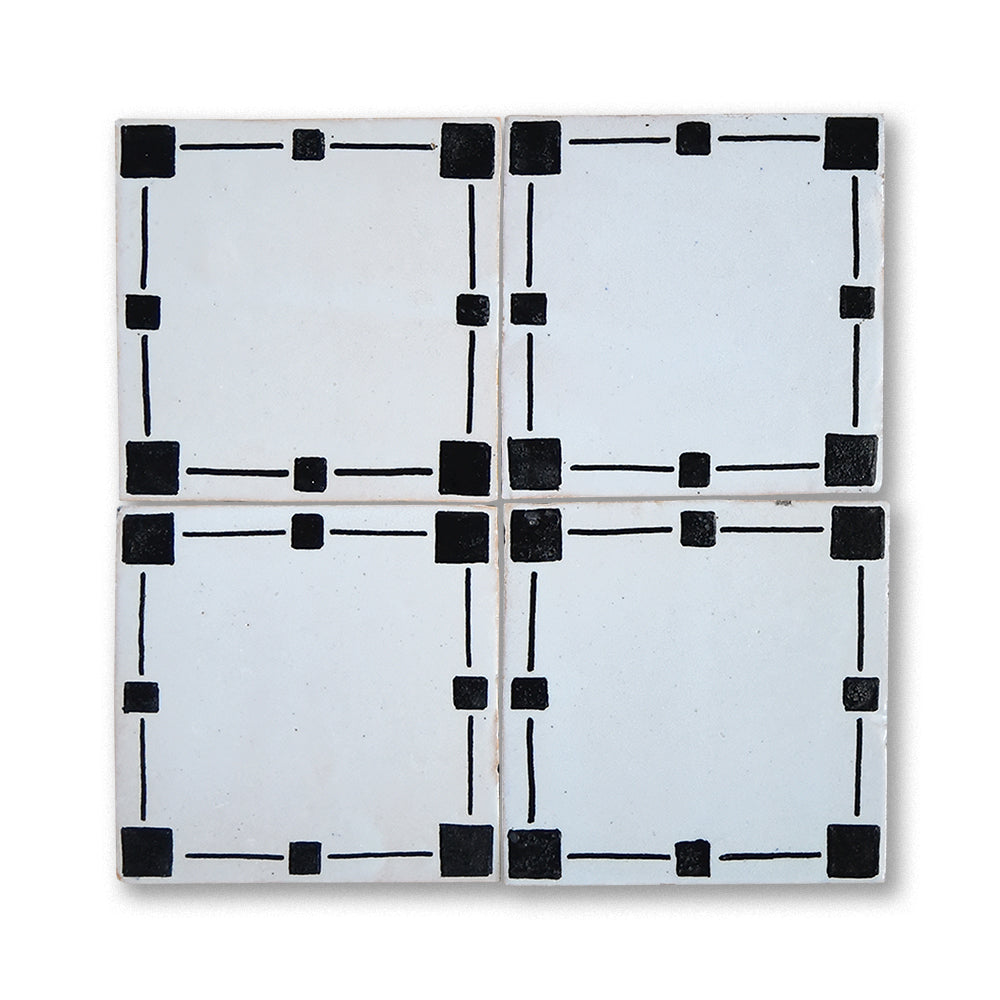 Hand-painted Moroccan zellige tiles in neutral tones