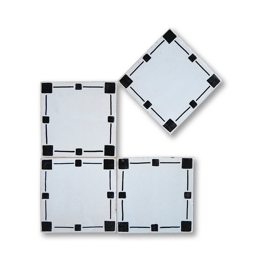 Hand-painted Moroccan zellige tiles in neutral tones
