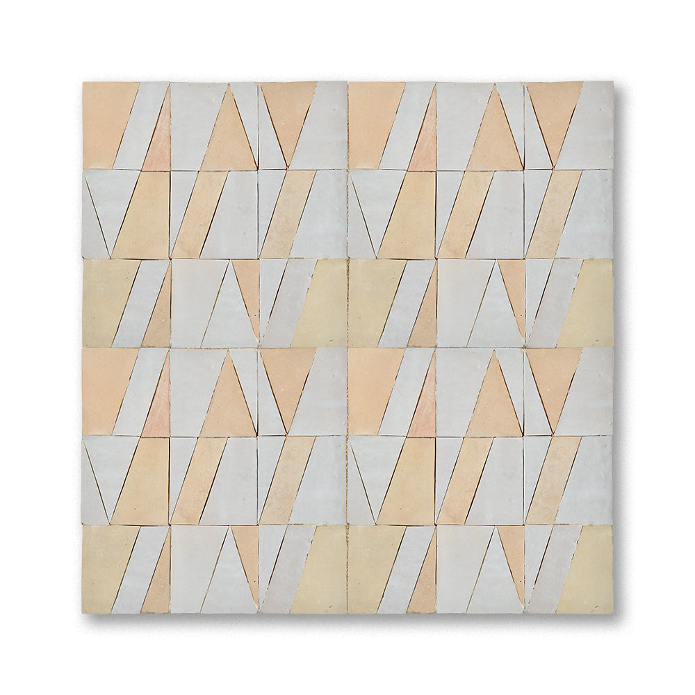 Cream and Fez Terra Cotta Tasmim zellige mosaic installed, warm geometric pattern