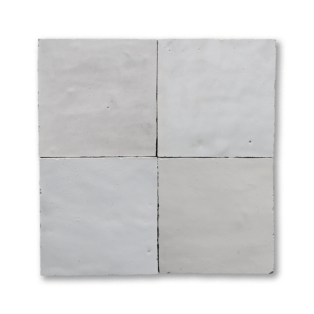 Concrete tile with a grid pattern on a white background