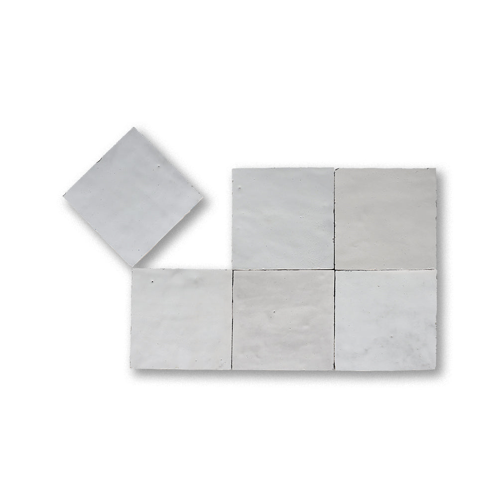Set of concrete tiles in various sizes on a white background