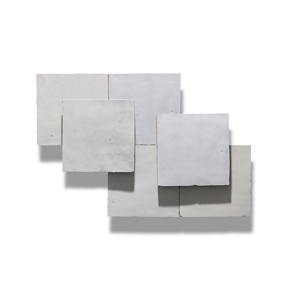 Set of concrete tiles with varying sizes on a white background