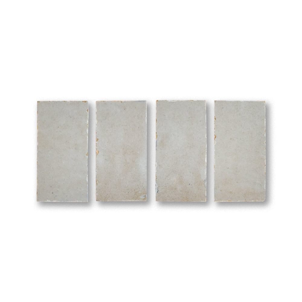 Five rectangular stone tiles of varying sizes on a white background