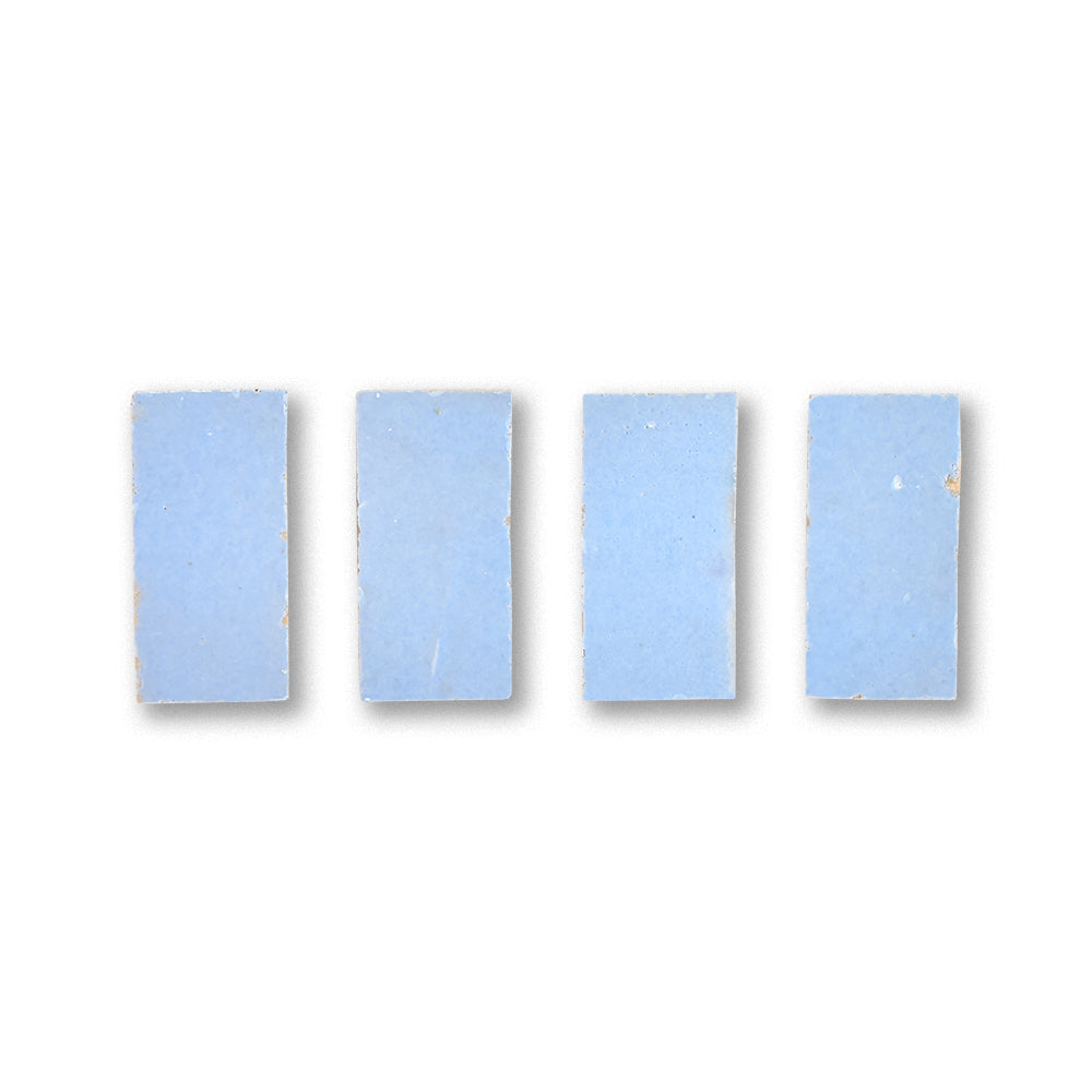 Five small blue rectangular tiles on a white background