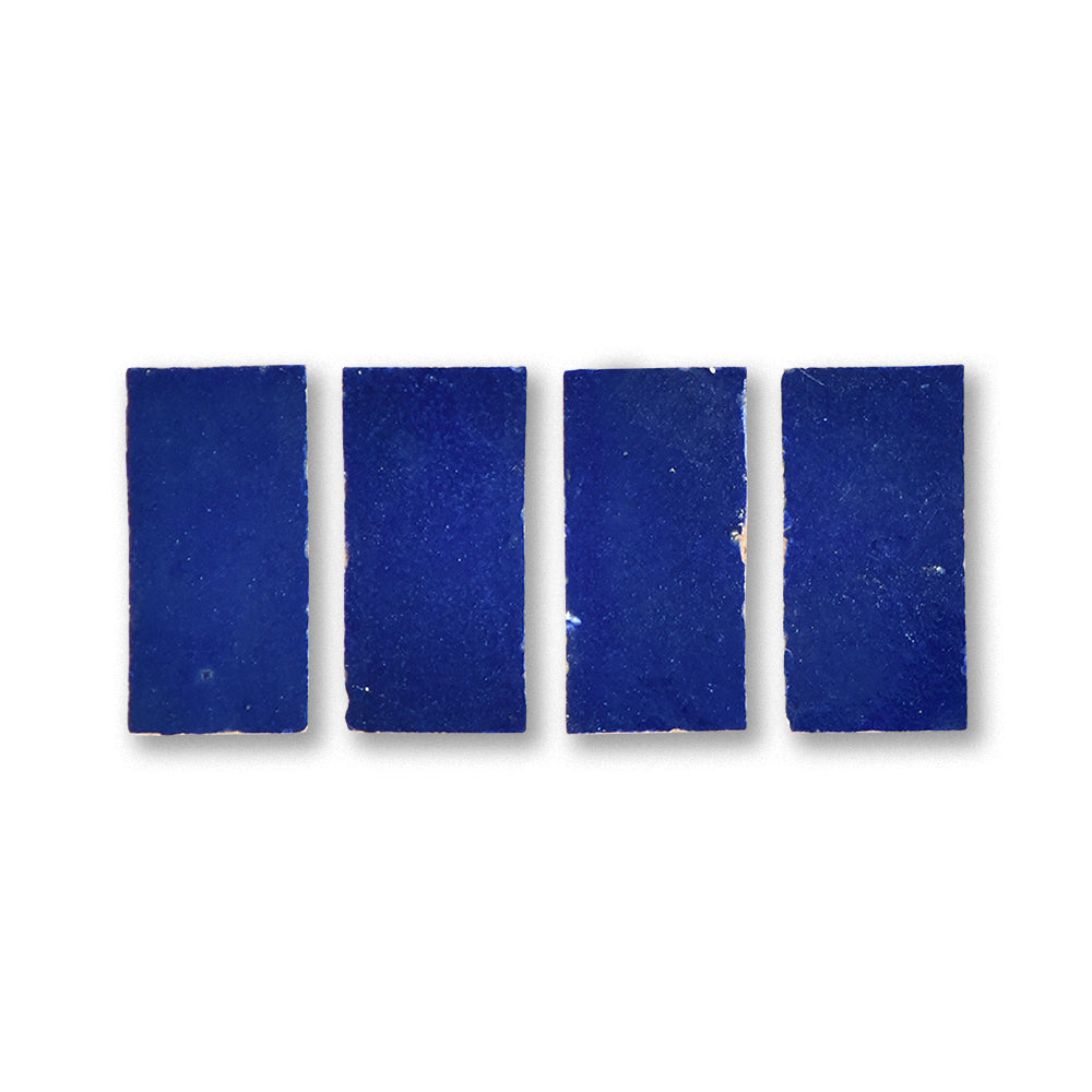 Four blue rectangular tiles on a white background