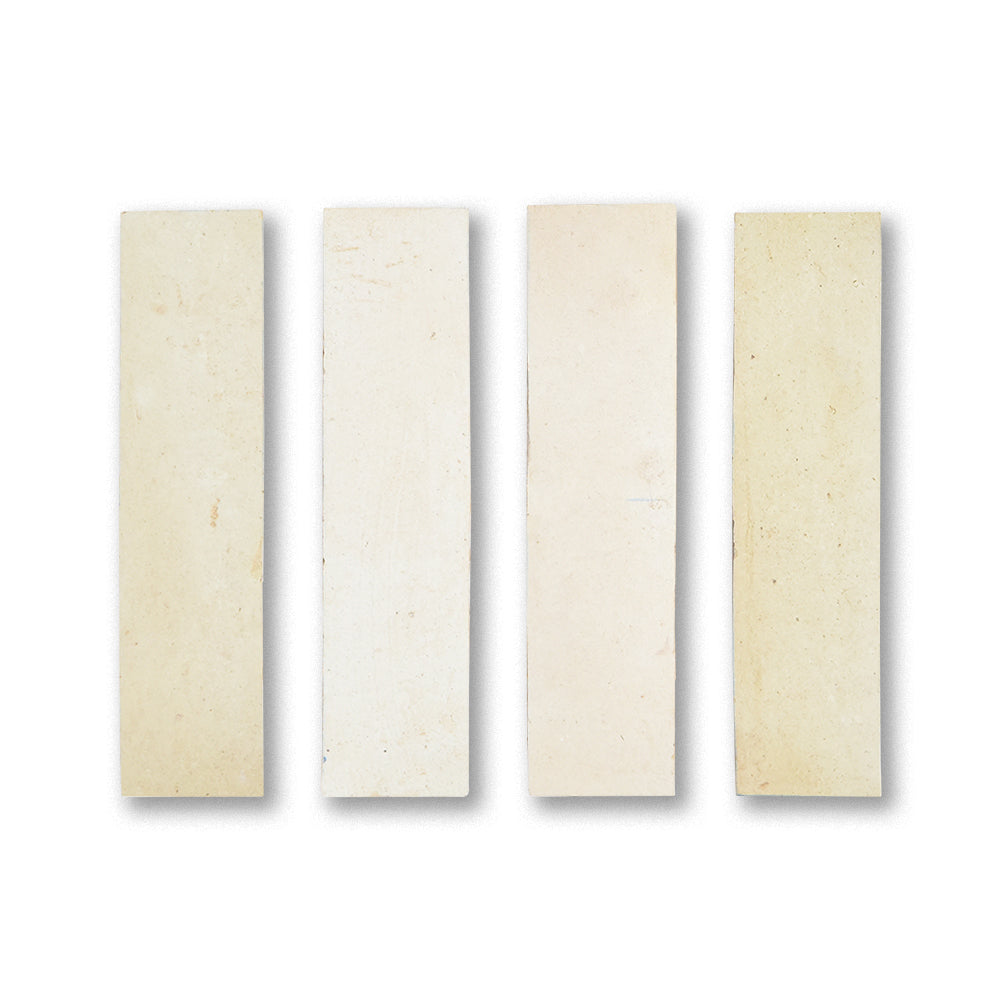 Four rectangular beige samples on a white background