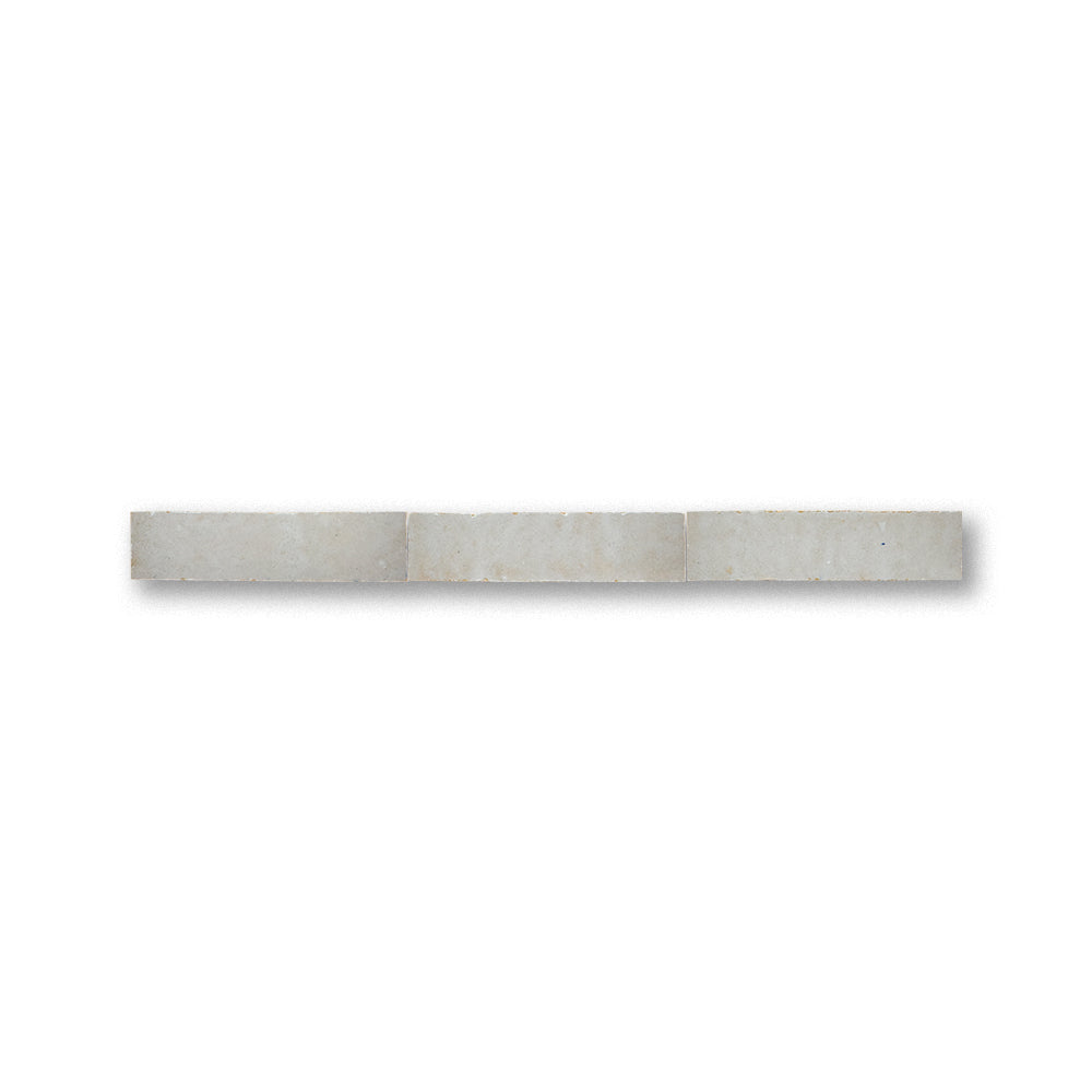 Long, narrow concrete slab on a white background