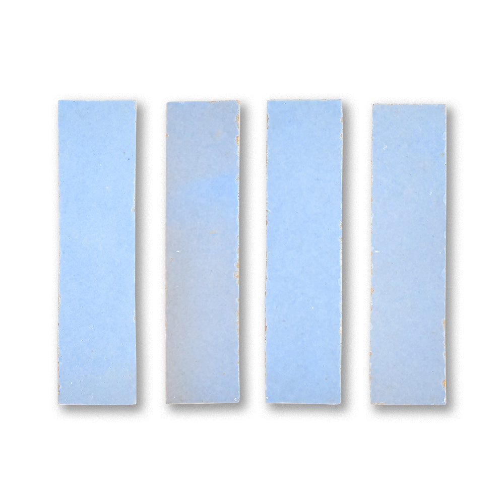 Four light blue rectangular tiles on a white background