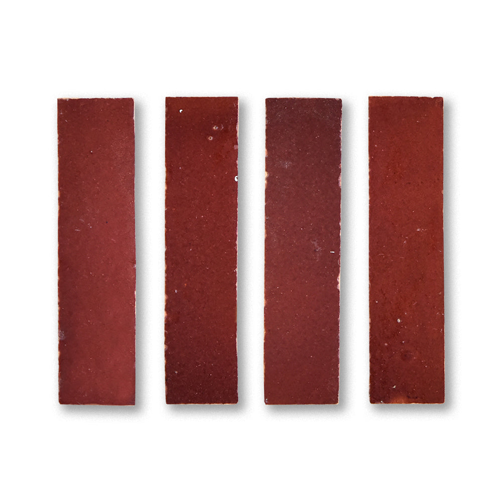 Four rectangular red sandpaper sheets on a white background