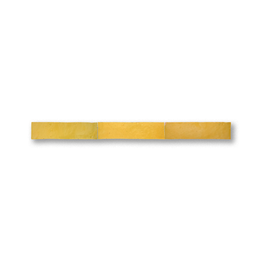 Three yellow rectangular tiles on a white background